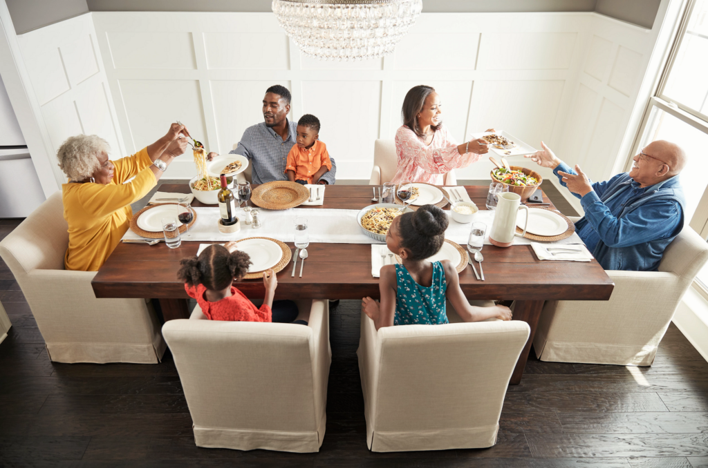 Family having breakfast at the dining table | Birons Flooring Inc